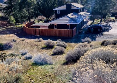 House surrounded by trees and shrubs